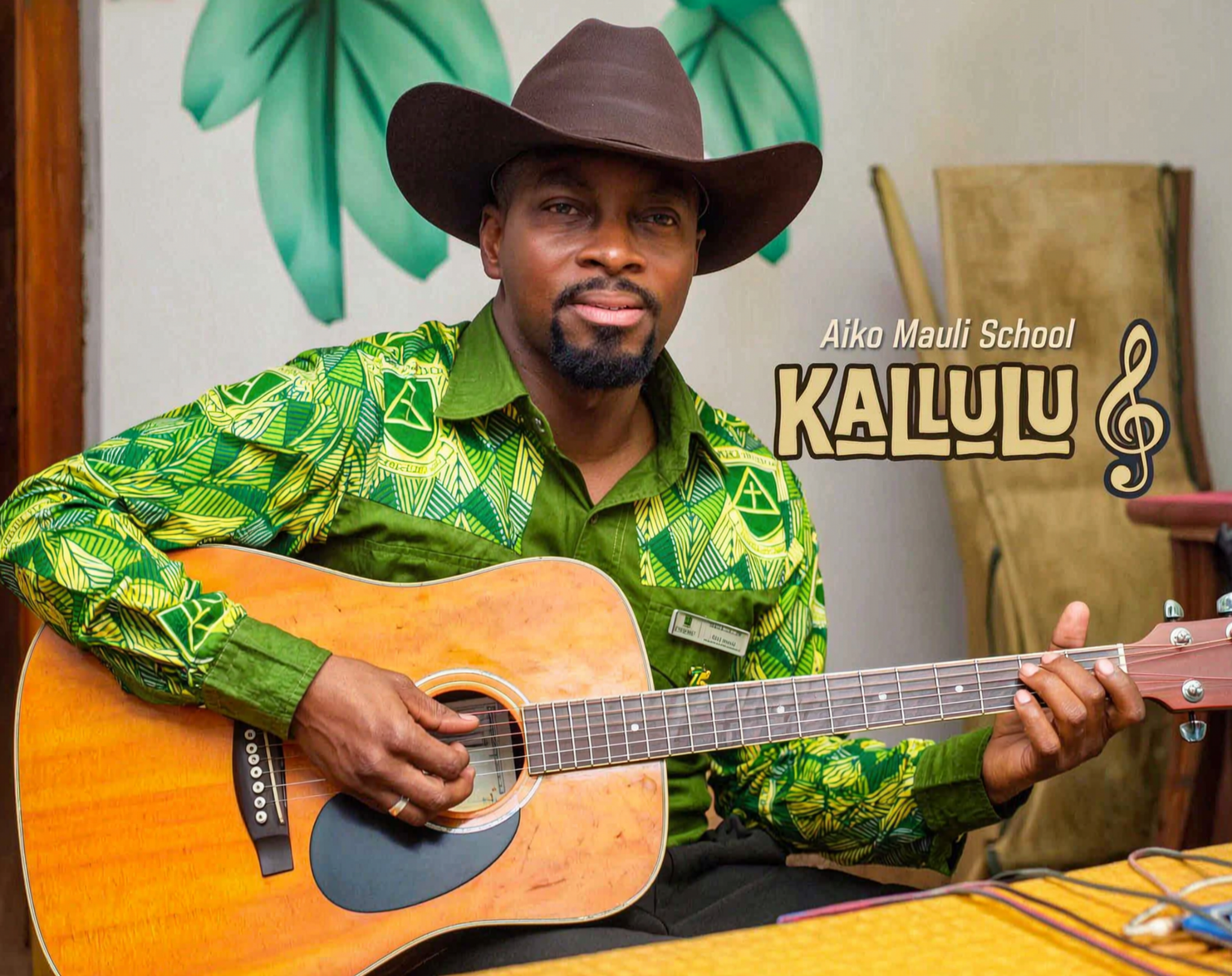 Kallulu with an acoustic guitar